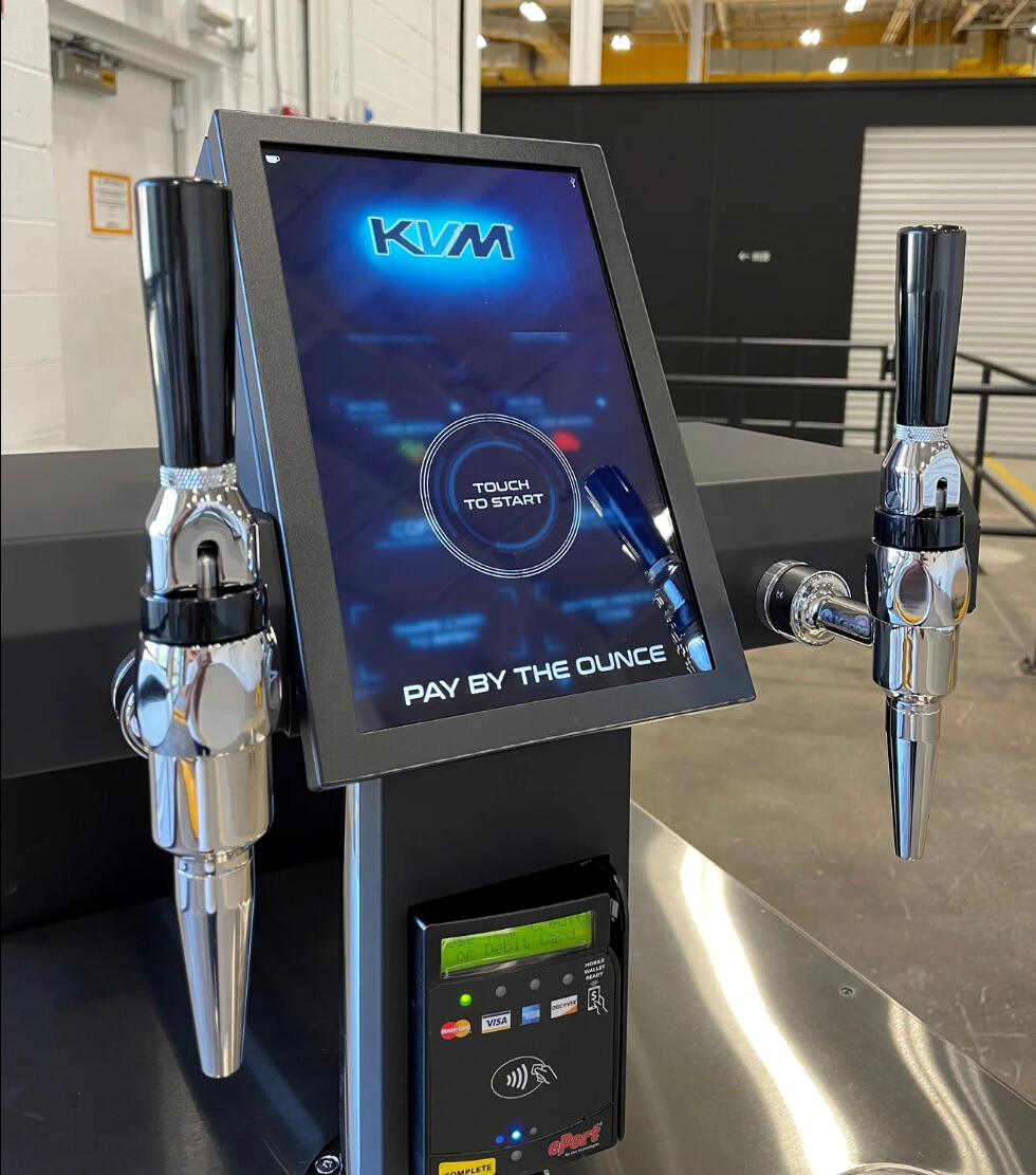 Close-up view of nitro cold brew coffee taps on self-serve kiosk, delivering a premium, on-site coffee vending experience for Austin establishments.